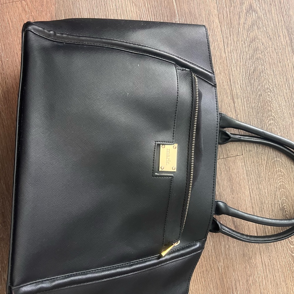 Mark. Black Bag with Gold Accents